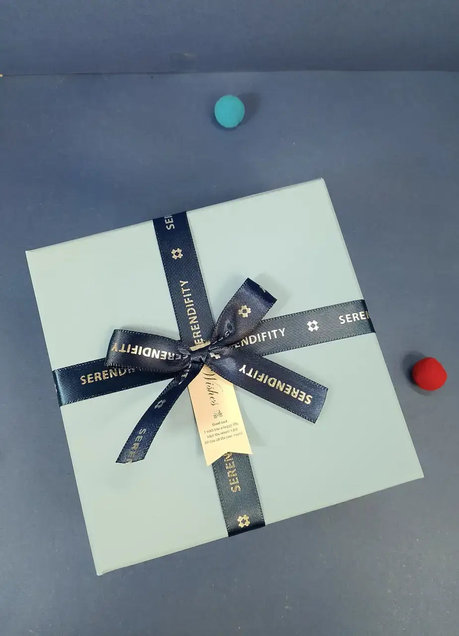 Blue Gift Box With Blue Ribbon
