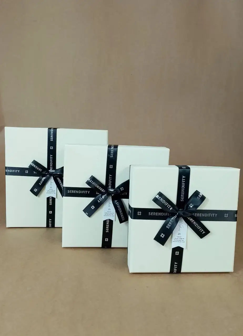 Off White Gift Box With Black Ribbon